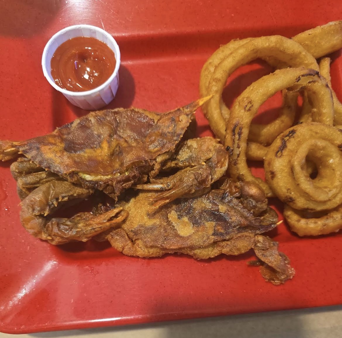 Fried soft shell crab with onion rings
